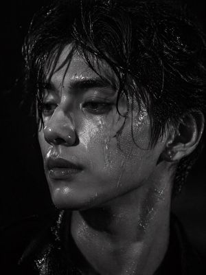 Generates a highly realistic, high-contrast black and white portrait emp...