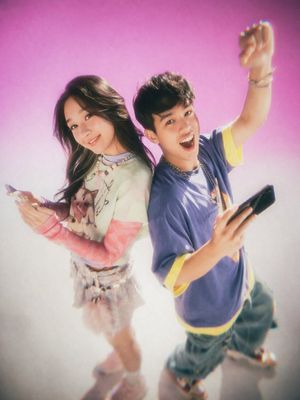 Generates a nostalgic, soft-focus studio portrait of two young adults po...